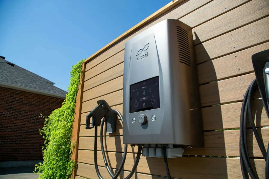 Wall-mounted EV charger on the outside of a home