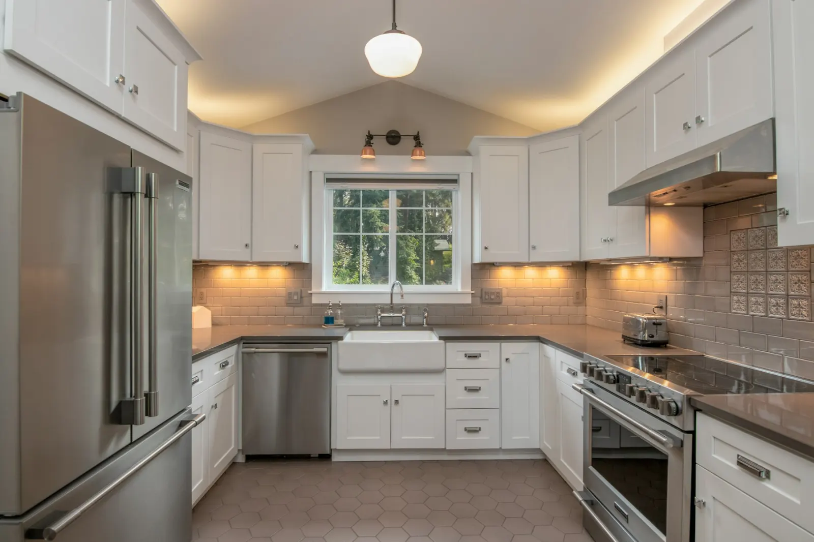 Kitchen lit by warm LED downlights